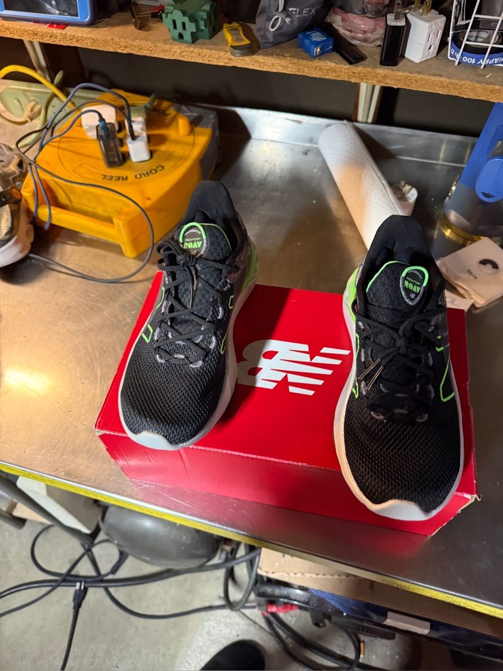 New Balance boys Black Athletic Shoes with Green Trim